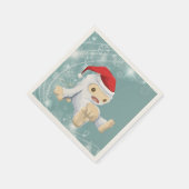 Weihnachts-Yeti-Puppe Eine Weihnachtsmannmütze tra Serviette (Ecke)