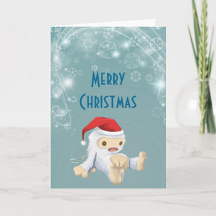 Weihnachts‑Yeti‑Puppe mit Weihnachtsmannmütze Feiertagskarte