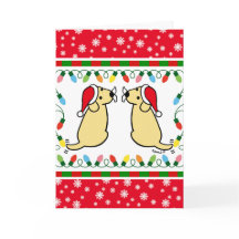 Weihnachts-Zwillingsgelbe Labradors Santa