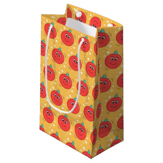 Weihnachtsball-Smiley-Retro-Cartozeichner Kleine Geschenktüte (Vorderseite Schrägansicht)