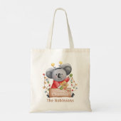 Weihnachtsbär mit Geschenk und Schneeflocken Tragetasche (Rückseite)