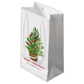 Weihnachtsbaum auf einem Wicker Korb Frohe Weihnac Kleine Geschenktüte (Vorderseite Schrägansicht)