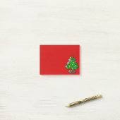Weihnachtsbaum auf roter Post-it-Notiz Post-it Klebezettel (Auf Schreibtisch)