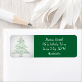 Weihnachtsbaum aus den Worten "Frohe Weihnachten" (Insitu)