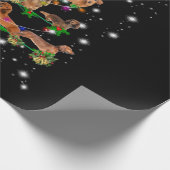 Weihnachtsbaum der Dackel, gedeckt durch Blitzlich Geschenkpapier (Ecke)