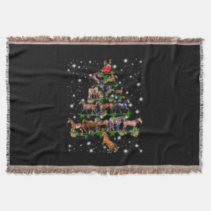 Weihnachtsbaum des Pferdes, bedeckt durch Blitzlic Decke