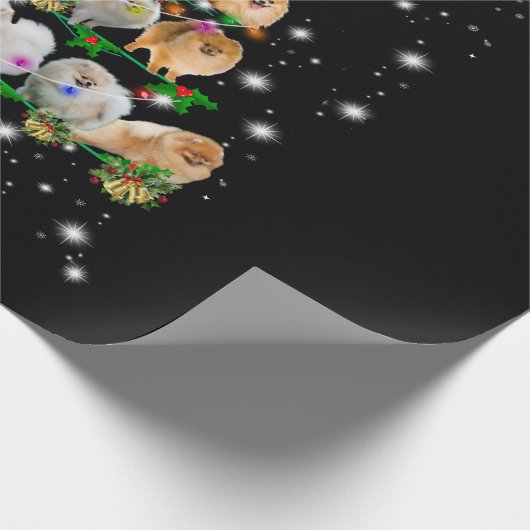 Weihnachtsbaum des Spitzes mit Lichteinfall Geschenkpapier (Ecke)