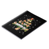 Weihnachtsbaum im Spitz mit leuchtendem Licht bede Notizblock (Linke Seite)