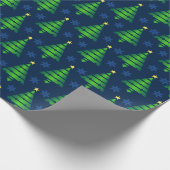 Weihnachtsbaum mit Blauer Schneeflocke und Hinterg Geschenkpapier (Ecke)