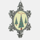 Weihnachtsbaum mit Dekorationsrot beugt Schneeflocken Zinn-Ornament (Links)