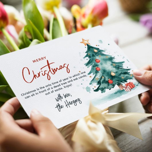 Weihnachtsbaum und präsentiert frohe Weihnachten