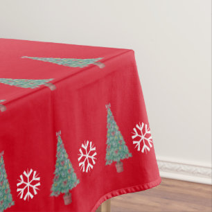 Weihnachtsbaumdekoration mit Rot beugt Goldglocken Tischdecke