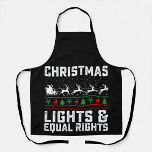 Weihnachtsbeleuchtung und Feministin für gleiche R Schürze