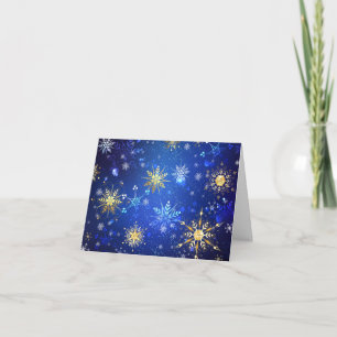 Weihnachtsblauer Hintergrund mit goldenen Schneefl Einladung