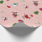 Weihnachtscharakter auf Rosa und GoldGlitzer Geschenkpapier (Ecke)