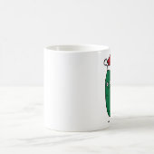 Weihnachtsdillgurke, die eine Weihnachtsmannmütze Kaffeetasse (Mittel)
