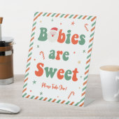 Weihnachtsdusche Babys sind süße Favoriten Sockelschild (In SItu)