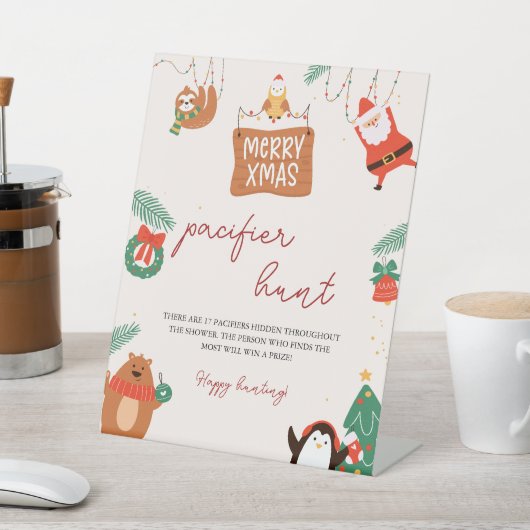 Weihnachtsdusche Schnuller Jagdspiel Sockelschild (In SItu)