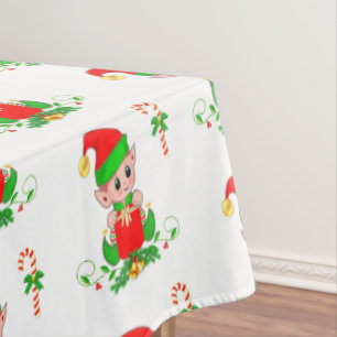 Weihnachtself und Candy Cane auf White Tableclout Tischdecke