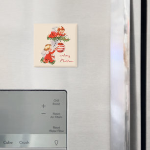 Weihnachtsengel, die den Weihnachtsbaum schmücken  Magnet