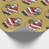 Weihnachtsfest mit süßem Spielzeug auf Golden Geschenkpapier (Ecke)