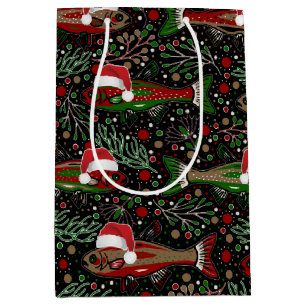 Weihnachtsfisch in Santa-Hüten Roter und grüner Fo Mittlere Geschenktüte