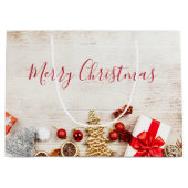 Weihnachtsgeschenkartikel auf einem rustikalen Hol Große Geschenktüte (Vorderseite)