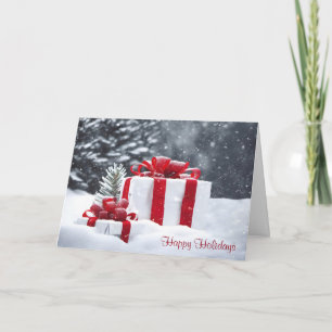 Weihnachtsgeschenke im Schnee Feiertagskarte