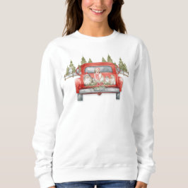 Weihnachtsgeschirr in einem Vintagen roten LKW Sweatshirt
