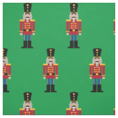 Weihnachtsgewebe mit niedlichem Nutcracker Stoff (Muster)