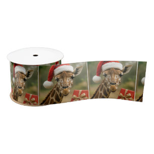 Weihnachtsgiraffe mit Feiertagsgeschenk Satinband