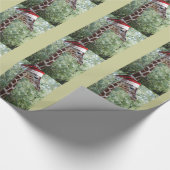 Weihnachtsgiraffe mit Weihnachtsmannmütze Geschenkpapier (Ecke)