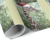 Weihnachtsgiraffe mit Weihnachtsmannmütze Geschenkpapier (Rolleneckpunkt)