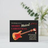 Weihnachtsgitarre Tragen einer Weihnachtsmannmütze Feiertagspostkarte (Stehend Vorderseite)