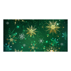 Weihnachtsgoldschneeflocken auf grünem Hintergrund Poster