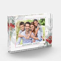 Weihnachtsgrün und Berries Foto