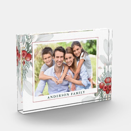 Weihnachtsgrün und Berries Foto (Links)