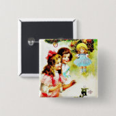 Weihnachtsgruß mit den Mädchen, die den Chris Button (Vorne & Hinten)