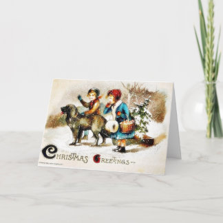 Weihnachtsgruß mit einem Jungen und einem gehenden Feiertagskarte