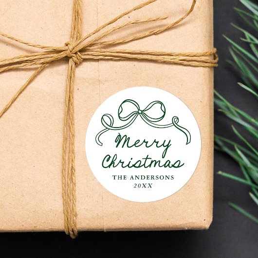 Weihnachtsgruß mit handgezeichneter grüner Schleif Runder Aufkleber