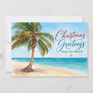 Weihnachtsgrüße von der tropischen Palme am Strand Feiertagskarte