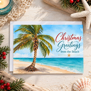 Weihnachtsgrüße von der tropischen Palme am Strand Feiertagskarte
