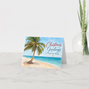 Weihnachtsgrüße von der tropischen Palme am Strand Feiertagskarte