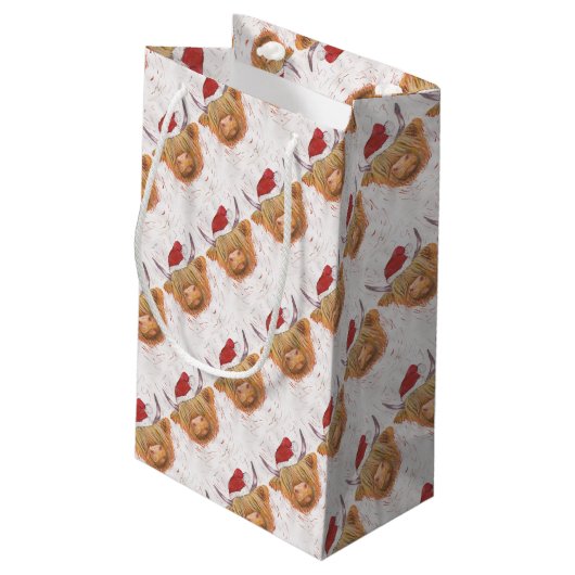 Weihnachtsgurren Hochland-Kuh mit Weihnachtshut Kleine Geschenktüte (Rückseite Schrägansicht)