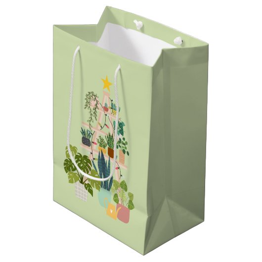 Weihnachtshaus-Pflanze Mittlere Geschenktüte (Vorderseite Schrägansicht)