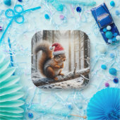 Weihnachtshörnchen auf dem Zweig des Schneebaumes Pappteller (Party)