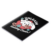 Weihnachtshund in der Weihnachtsmannmütze - Feiert Notizblock (Linke Seite)