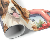 Weihnachtshund mit Geschenkpapier (Rolleneckpunkt)