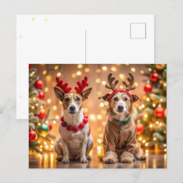 Weihnachtshunde als Rentiere gekleidet Feiertagspostkarte