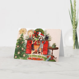 Weihnachtskarte im Kamin mit zwei Frauen Feiertagskarte